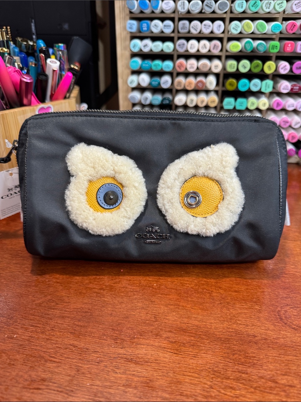 Coach cosmetics pouch from Coach Creatures collection.